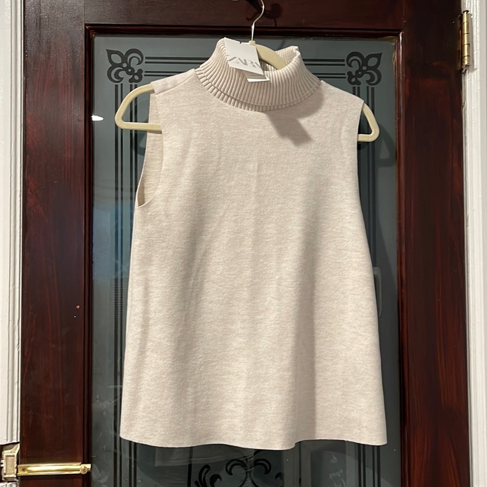 Soft turtleneck tank top in cream